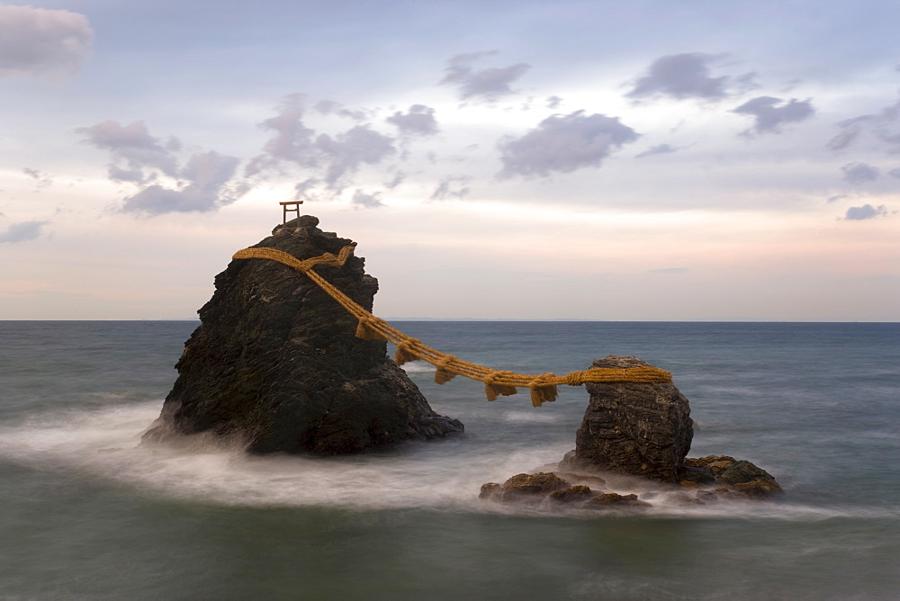 Meoto-Iwa (Wedded Rocks), two rocks considered to be male and female and joined in matrimony by shimenawa (sacred ropes), renewed in a special festival each year, Futami, Ise-Shima, Chubu, Central Honshu, Japan, Asia