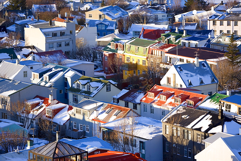 Low aerial view from Hallgrimskirka of the colourful houses and commercial buildings of the city, Reykjavik, Iceland, Polar Regions