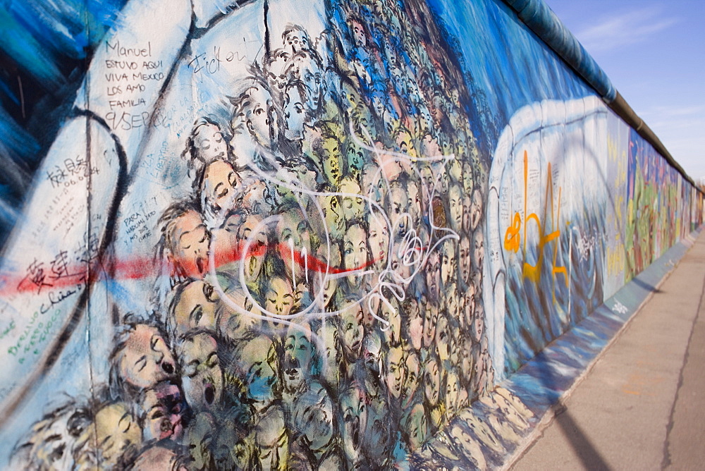 View from former East Berlin of a section of Berlin Wall, also called East Side Gallery because it has been painted by many international artists, Berlin, Germany, Europe