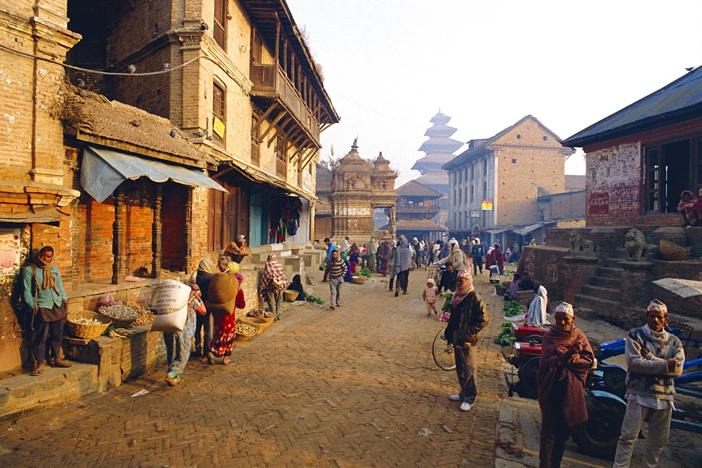 Early morning market in the street, Bhaktapur (Bhadgaun), Kathmandu Valley, Nepal