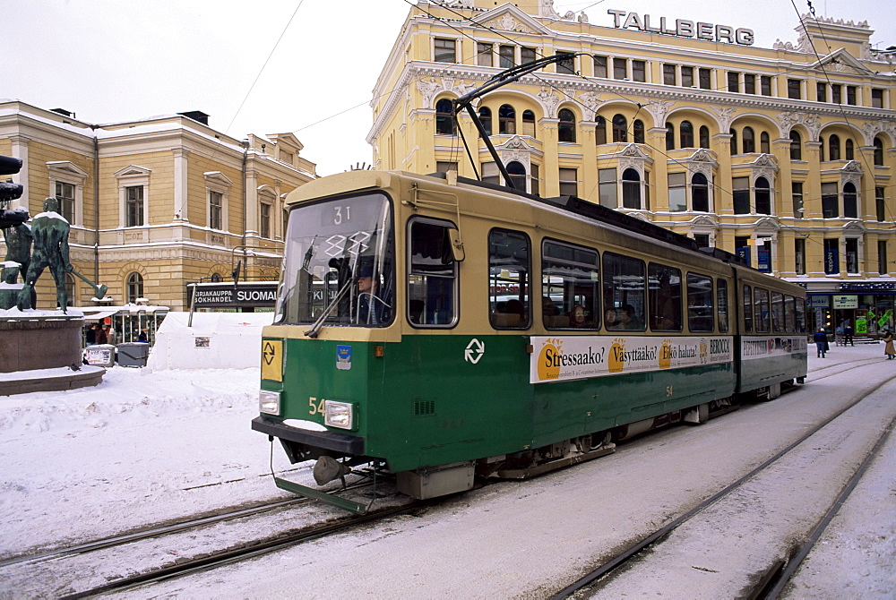 Tram in street in winter, Helsinki, Finland, Scandinavia, Europe