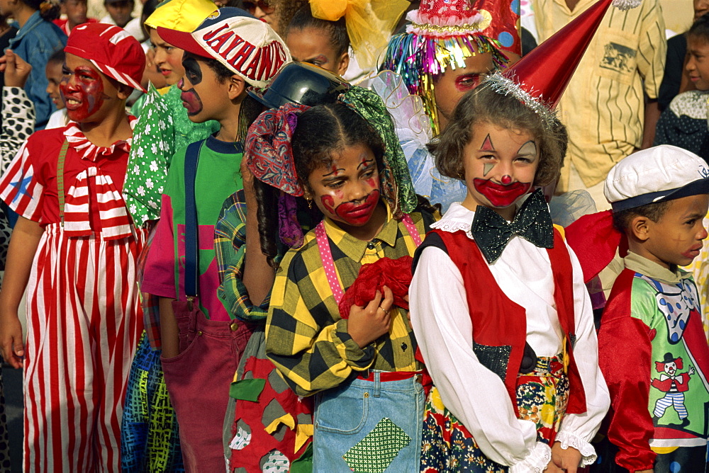 Portrait of children with painted faces during the Mardi Gras Festival in the city of Mindelo, Sao Vicente Island, Cape Verde Islands, off West Africa, Africa