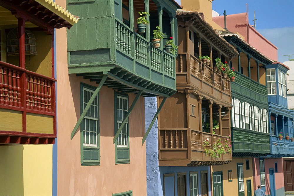 Facades of painted houses with overhanging wooden balconies in Santa Cruz de la Palma, on La Palma, Canary Islands, Spain, Europe