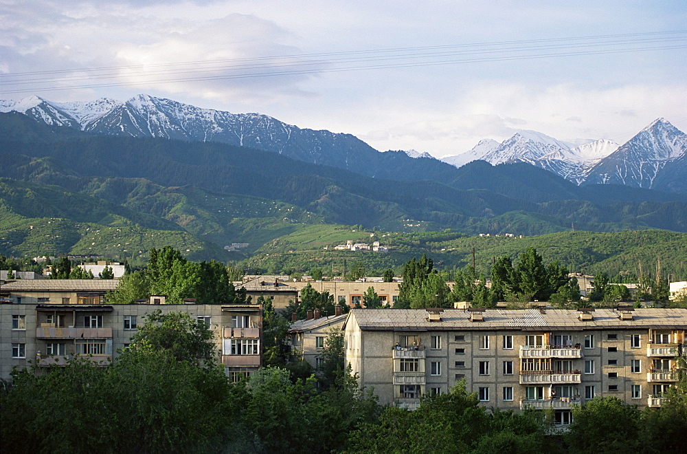 City apartments, Alma Ata, and Kungey-Ala-Too mountains, Kazakstan, Central Asia, Asia