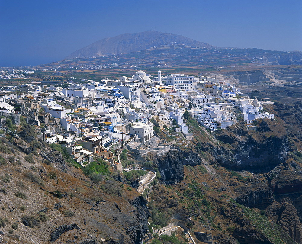 Aerial view over the houses of Fira Town, the capital of Santorini (Thira), perched on the Caldera Rim, Cyclades Islands, Greek Islands, Greece, Europe