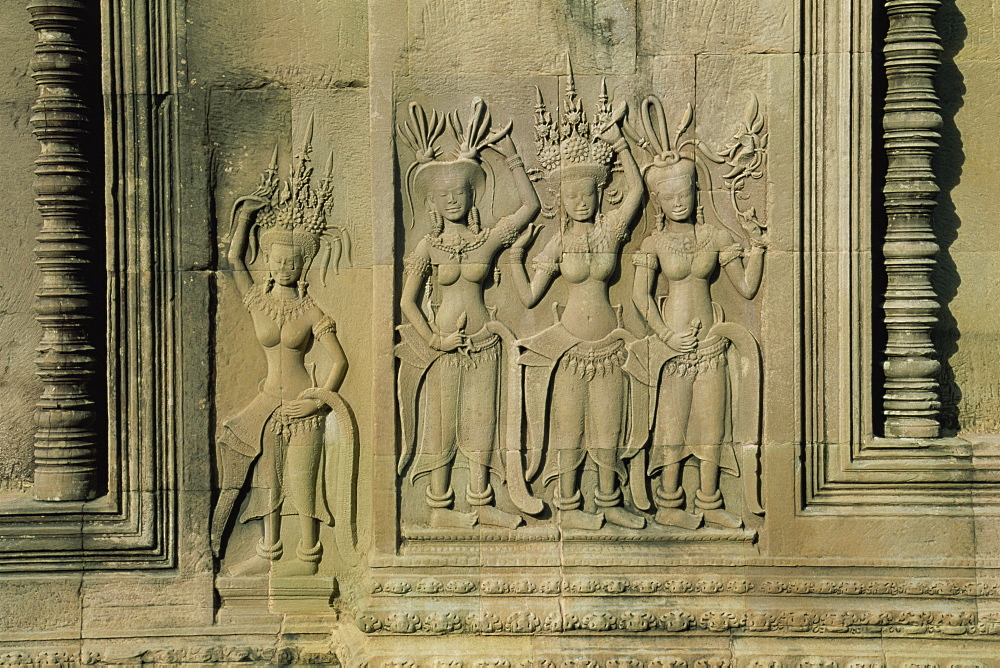 Stone bas reliefs depicting scenes of rural life and historical events on the walls of Angkor Wat, UNESCO World Heritage Site, Siem Reap, Cambodia, Indochina, Southeast Asia, Asia