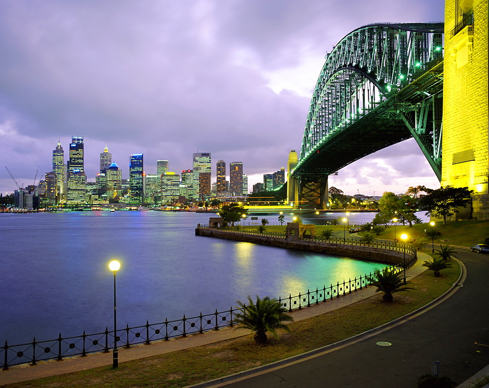 City skyline and the Sydney Harbour Bridge at dusk, Sydney, New South Wales, Australia