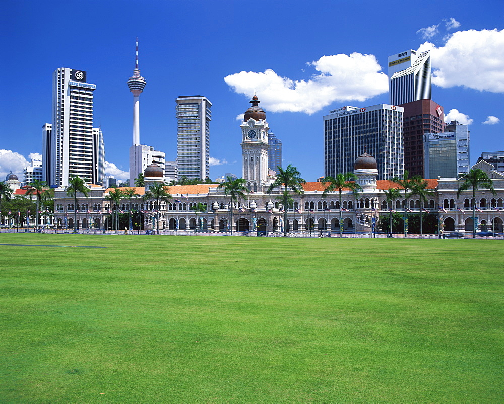 The city skyline from Merdeka Square with the Sultan Abdul Samad Building and Petronas Towers in the centre of Kuala Lumpur, Malaysia, Southeast Asia, Asia