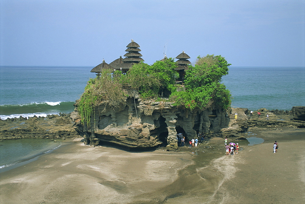 A group of tourists visit the Tanalot Temple on the island of Bali, Indonesia, Southeast Asia, Asia