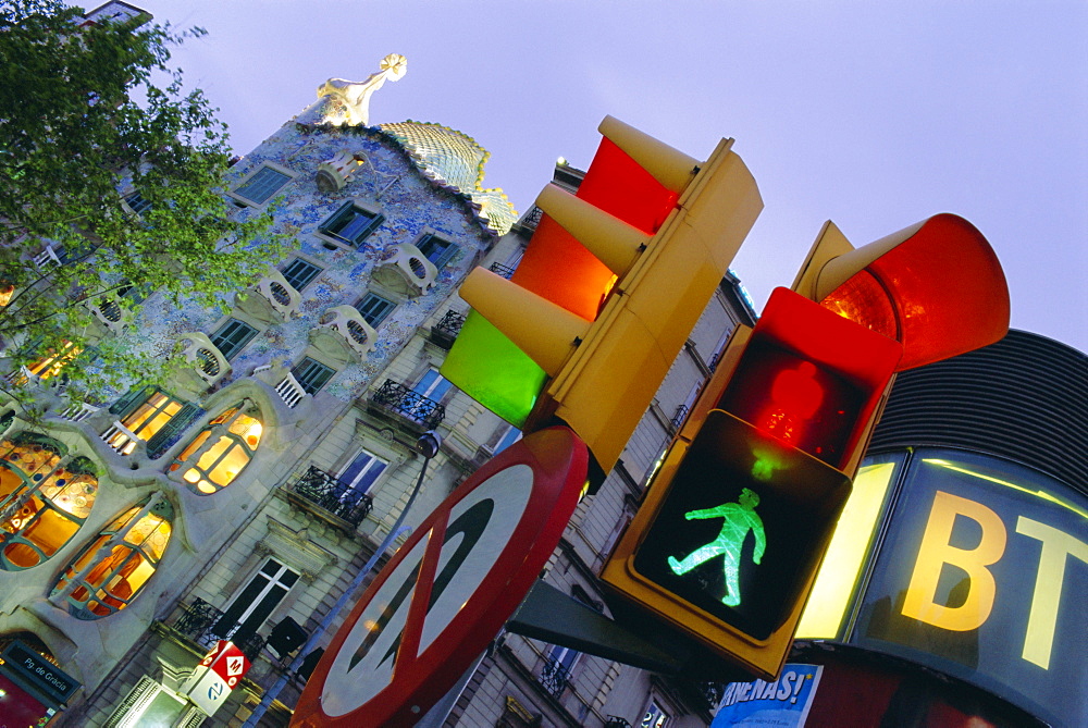 Casa Balli, Gaudi architecture, and street signs, Barcelona, Spain