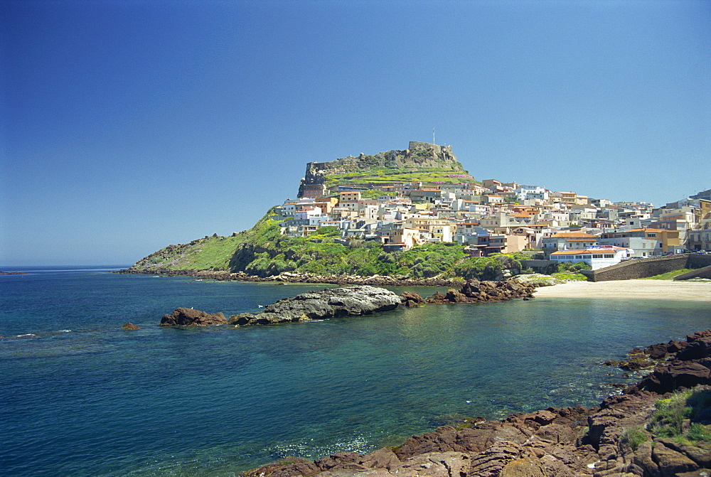 Rocky coast and the houses and fort of Castelsardo on the island of Sardinia, Italy, Mediterranean, Europe