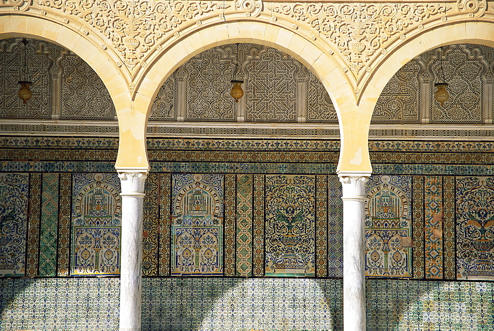 Close-up of arches and decorated walls, Zaouia of Sidi Sahab, Kairouan, Tunisia, North Africa, Africa