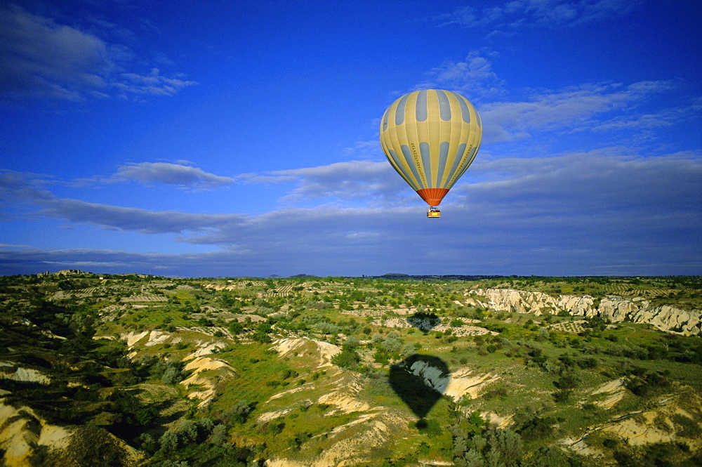 Hot air ballooning above Cappadocian landscape, Cappadocia, Anatolia, Turkey, Asia Minor, Asia