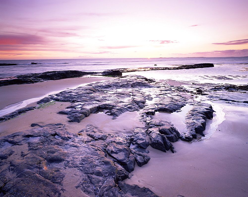 Sunrise over North Sea from Bamburgh beach, Bamburgh, Northumberland, England, United Kingdom, Europe