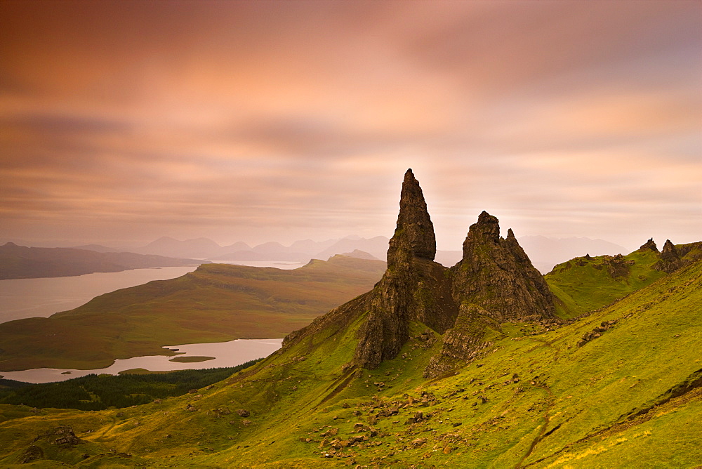 Old Man of Storr at dawn with Cuillin Hills in distance, near Portree, Isle of Skye, Highland, Scotland, United Kingdom, Europe