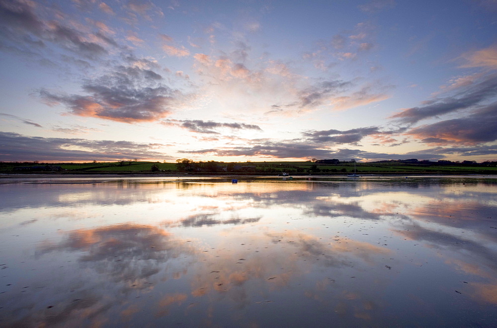 View across the Aln Estuary at sunset, Alnmouth, near Alnwick, Northumberland, England, United Kingdom, Europe