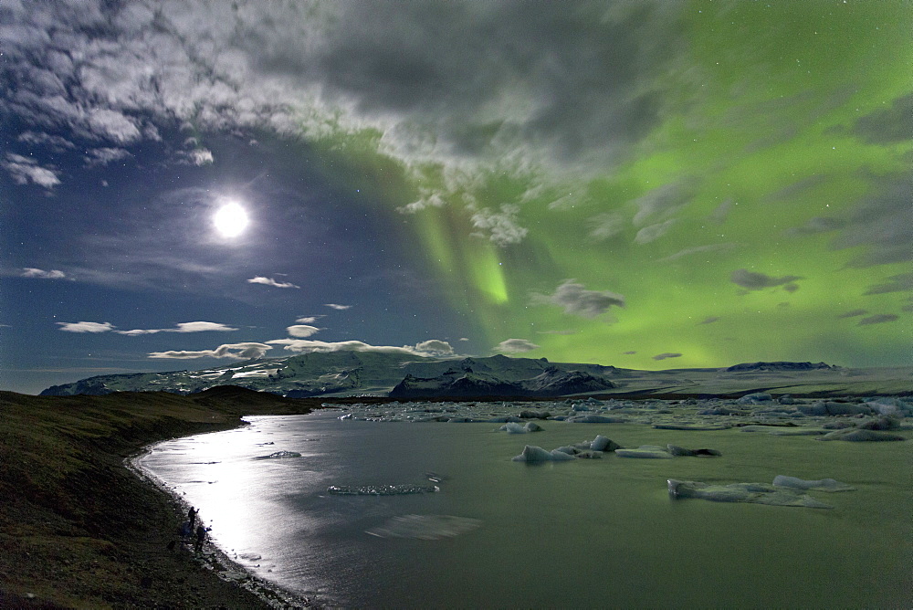 The Aurora Borealis (Northern Lights) captured in the night sky over Jokulsarlon glacial lagoon on the edge of the Vatnajokull National Park, during winter, South Iceland, Iceland, Polar Regions