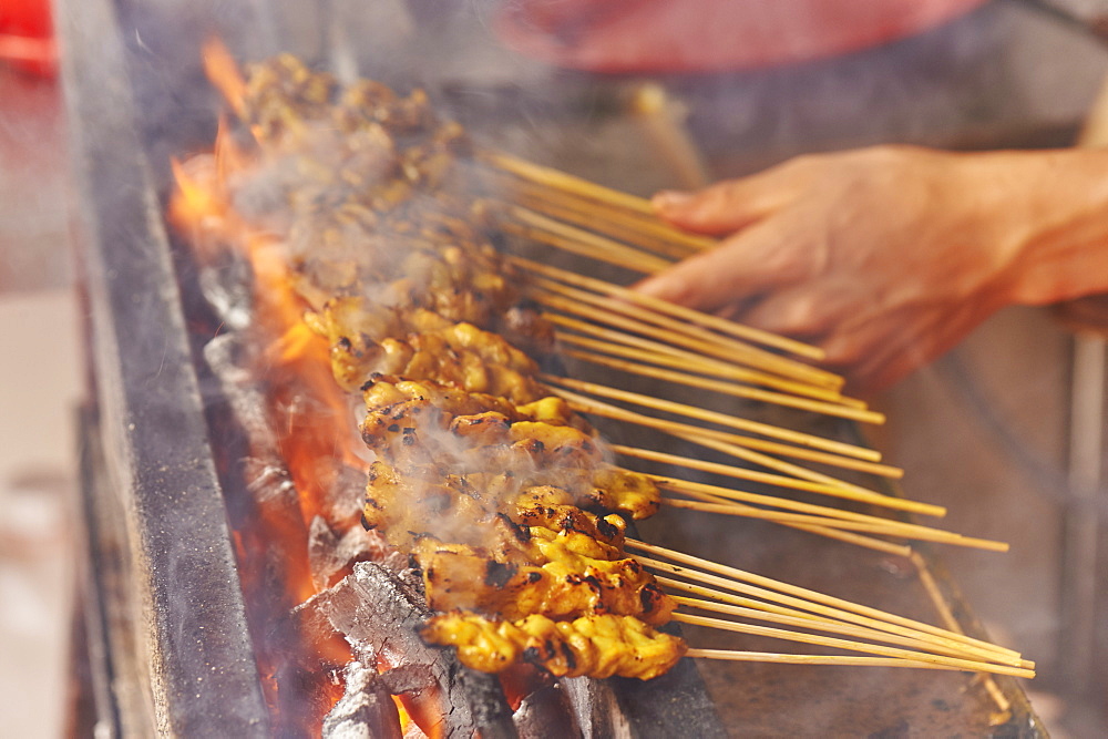 Detail, chicken satay cooked at street market, Chinatown, Malacca, Malaysia, Southeast Asia, Asia