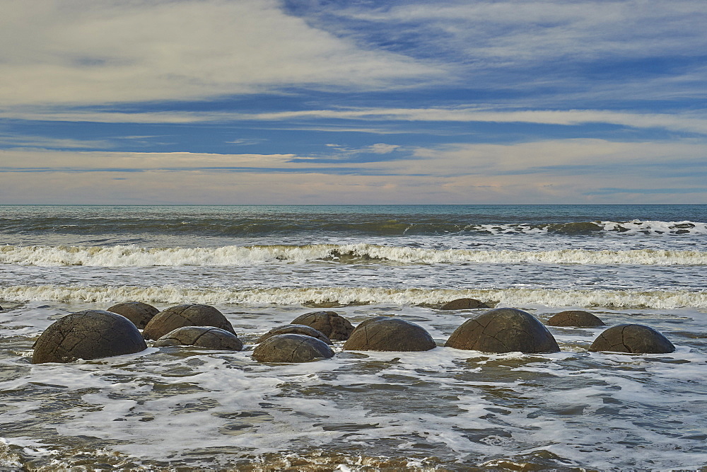 Moeraki Boulders, a group of very large spherical boulders on Koekohe Beach near Moeraki on the coast of Otago, South Island, New Zealand, Pacific