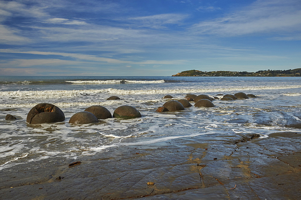 Moeraki Boulders, a group of very large spherical boulders on Koekohe Beach near Moeraki on the coast of Otago, South Island, New Zealand, Pacific