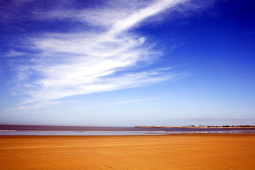 Middle of Newton beach, Porthcawl on a sunny spring morning with big blue sky, Porthcawl, Mid-Glamorgan, Wales, United Kingdom, Europe