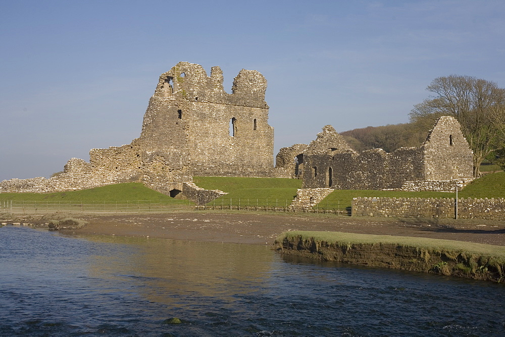 Ogmore castle beside the Ewenny River on a sunny spring afternoon, Glamorgan, Wales, United Kingdom, Europe