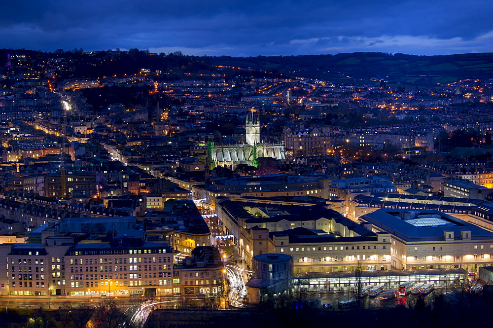 An aerial view of central Bath shows the Abbey and Southgate development at dusk, Bath, Avon, England, United Kingdom, Europe