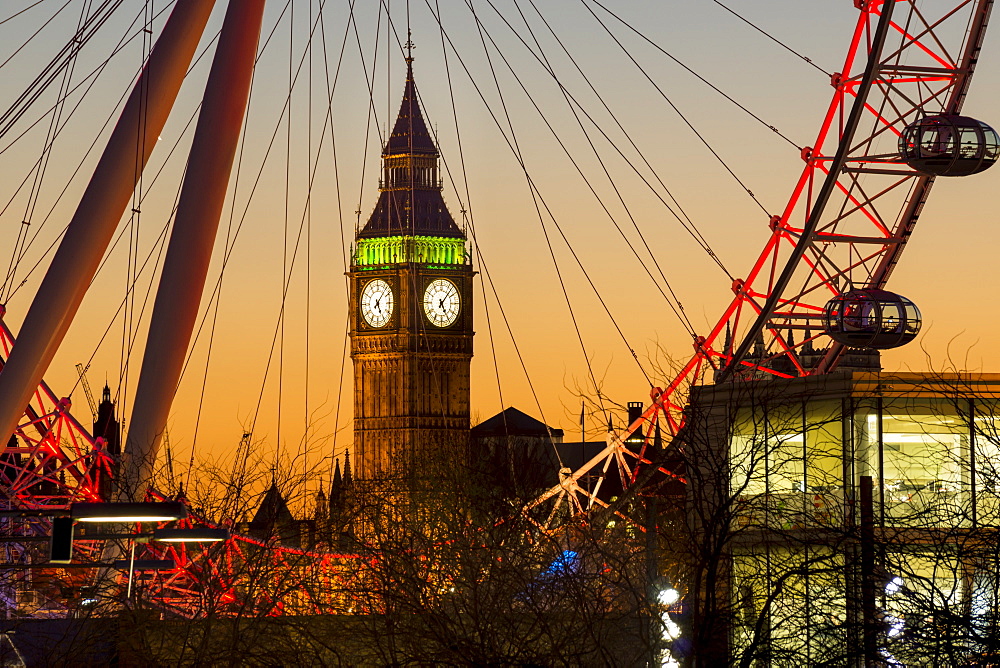 London Eye (Millennium Wheel) frames Big Ben at sunset, London, England, United Kingdom, Europe