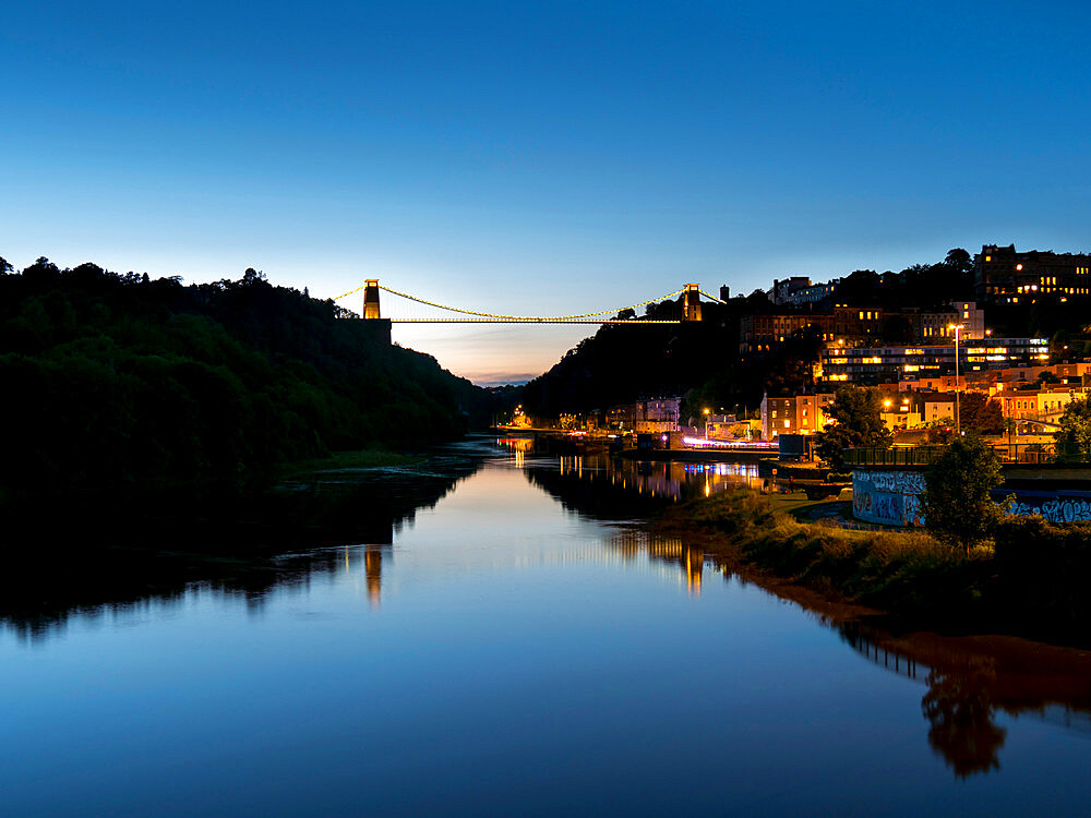 Clifton Suspension Bridge reflected in River Avon at dusk, Bristol, England, United Kingdom, Europe