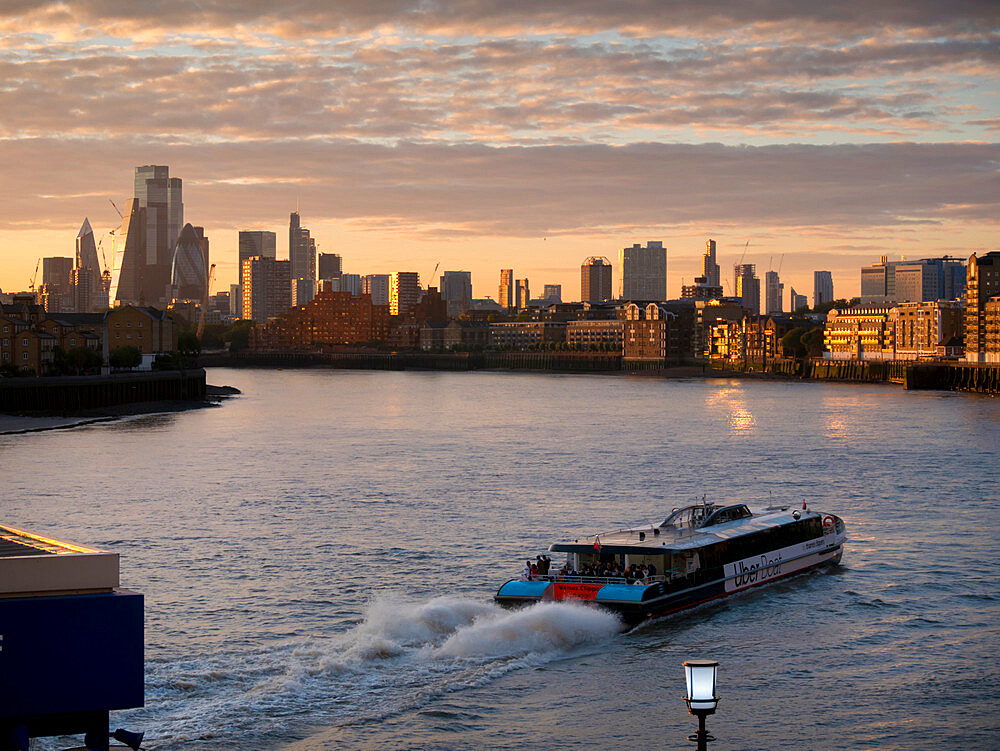 City of London skyline and River Thames from Canary Wharf Clipper, London, England, United Kingdom, Europe