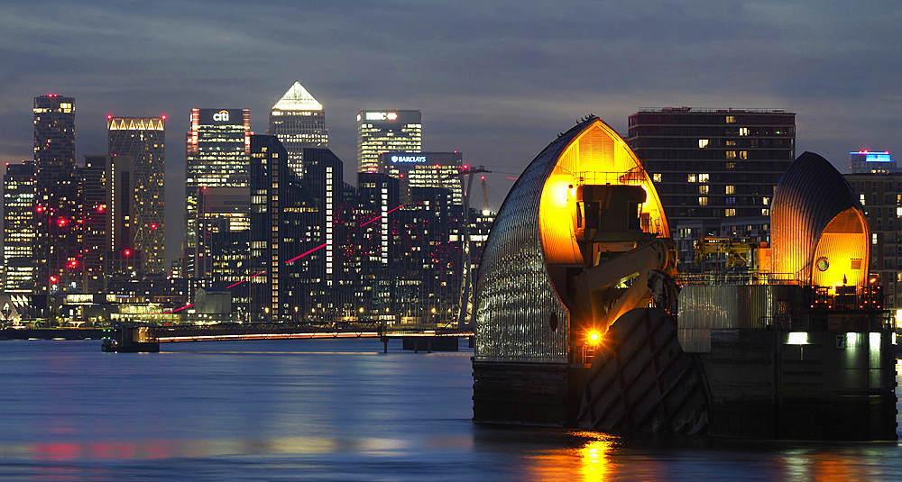 Canary Wharf, Docklands, and Thames Barrier at dusk, London, England, United Kingdom, Europe