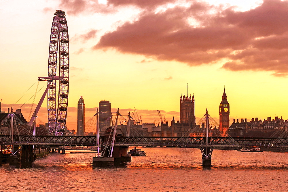 Skyline of London at dusk, with London Eye (Millennium Wheel), Big Ben and Houses of Parliament, London, England, United Kingdom, Europe