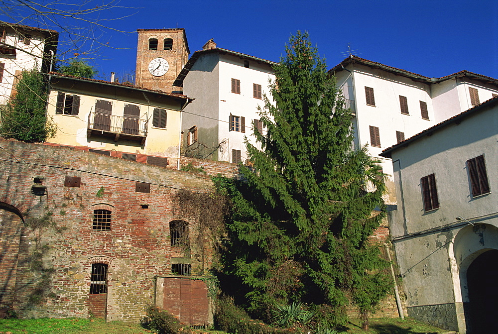 Houses and clocktower in the medieval quarter of the town of Casalborgone near Turin in Piemonte, Italy, Europe