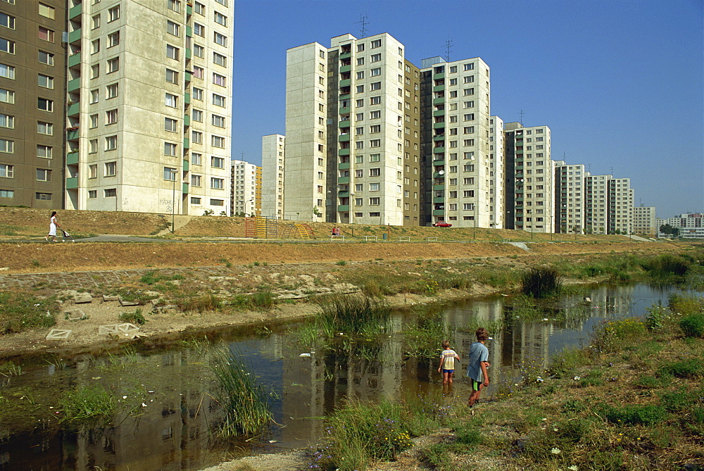 Boys fishing on the Petrzalka estate in the city of Bratislava, Slovakia, Europe