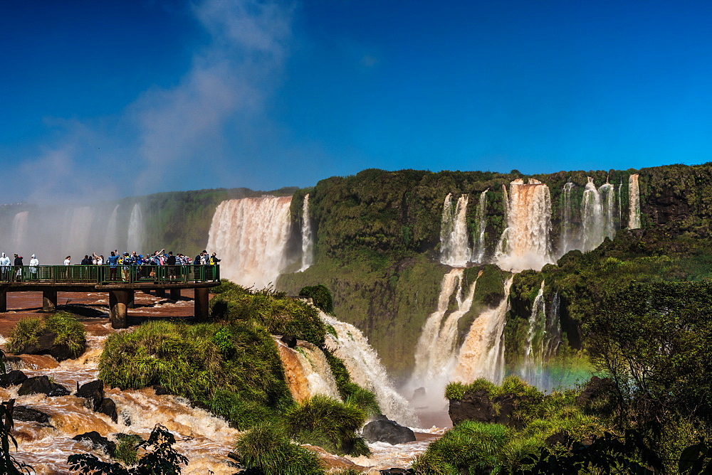 Visitors, drenched in spray, Garganta del Diablo (Devil's Throat), Iguazu Falls, UNESCO World Heritage Site, Iguazu, Brazil, South America