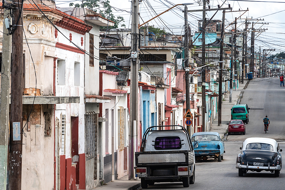 A jungle of telephone lines in a street behind the docks, Regla, Havana, Cuba