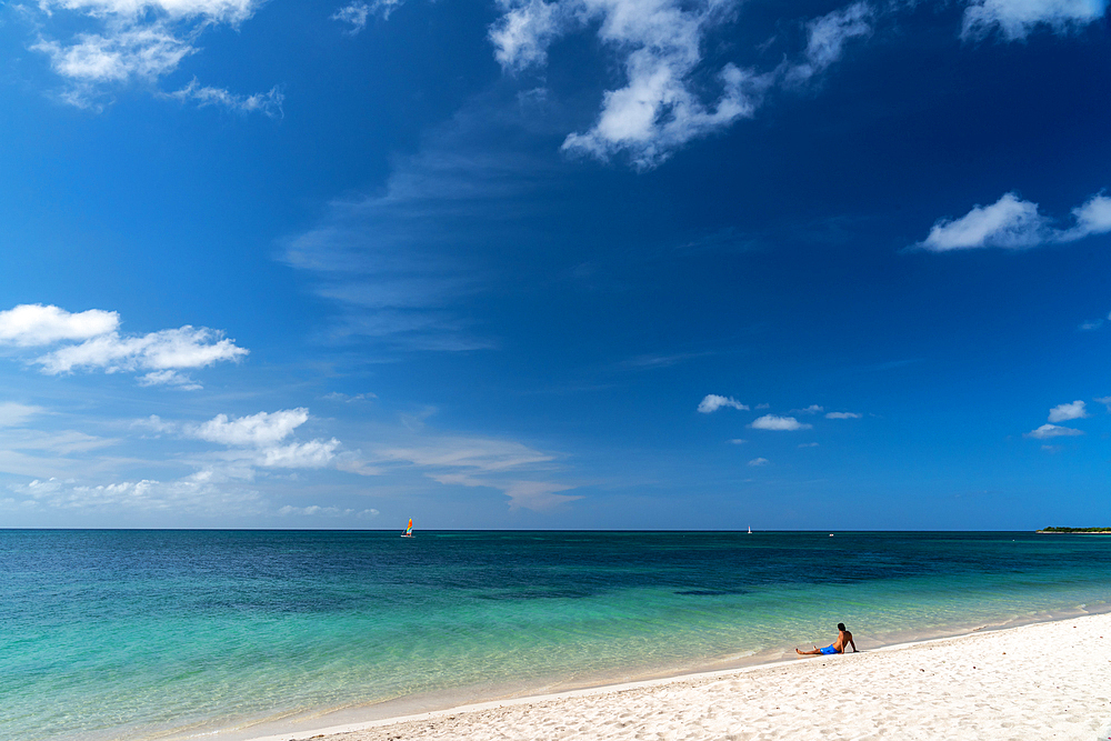 One man and his white sand beach, Trinidad, Cuba