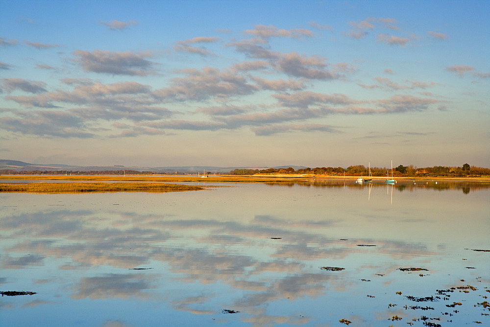 Boats moored at East Head, West Wittering, near Chichester, West Sussex, England, United Kingdom, Europe