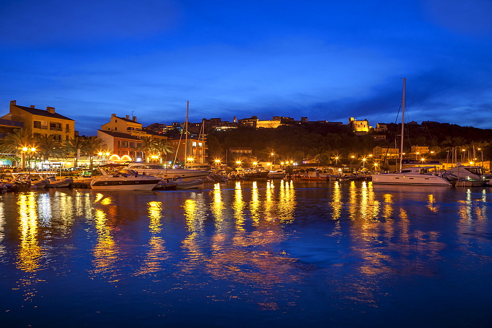 Harbour lit up at dusk, Porto Vecchio, Corsica, France, Mediterranean, Europe