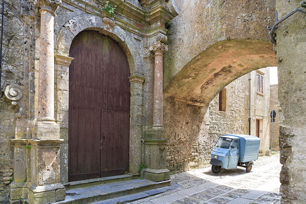 Erice, small truck parked under arch in back street, Sicily, Italy, Europe