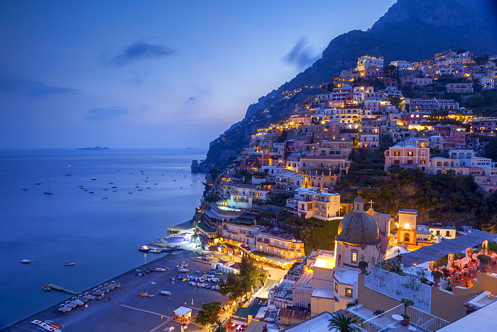 Positano and beach at dusk, Amalfi Coast (Costiera Amalfitana), UNESCO World Heritage Site, Campania, Italy, Mediterranean, Europe