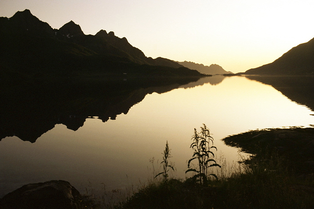 Midnight sun and calm reflections, Lofoten Islands, Arctic, Norway, Scandinavia, Europe