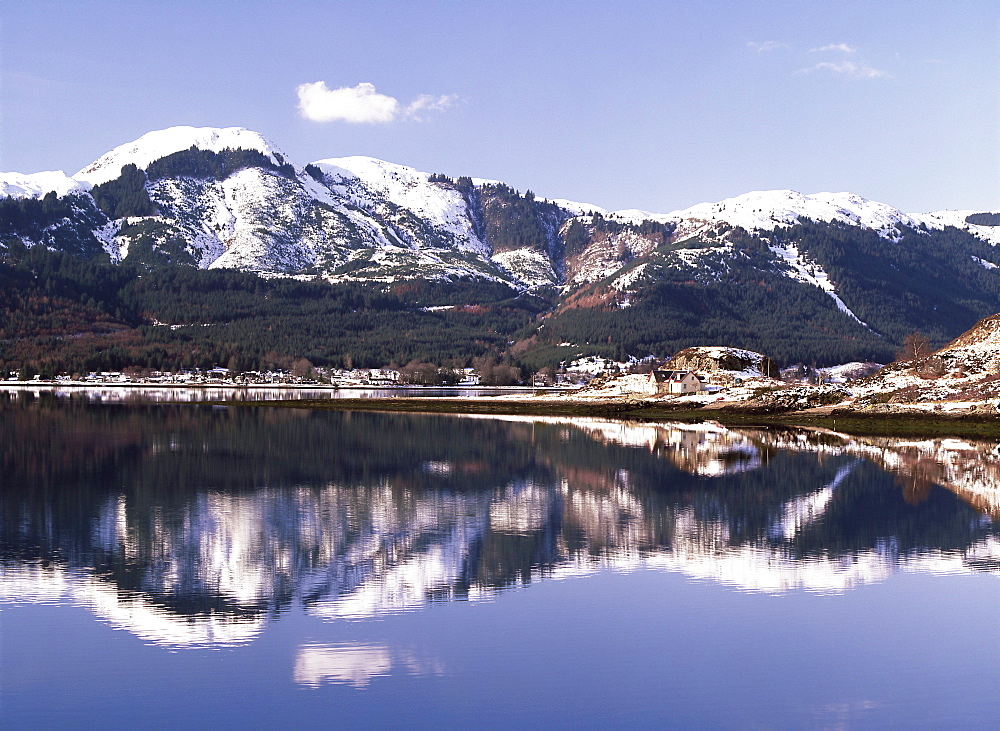 Reflections on Loch Duich, looking south from A87 bridge towards Ratagan village, with snow on Ratagan Pass, Shell Bridge, Highlands Region, Scotland, UK, Europe