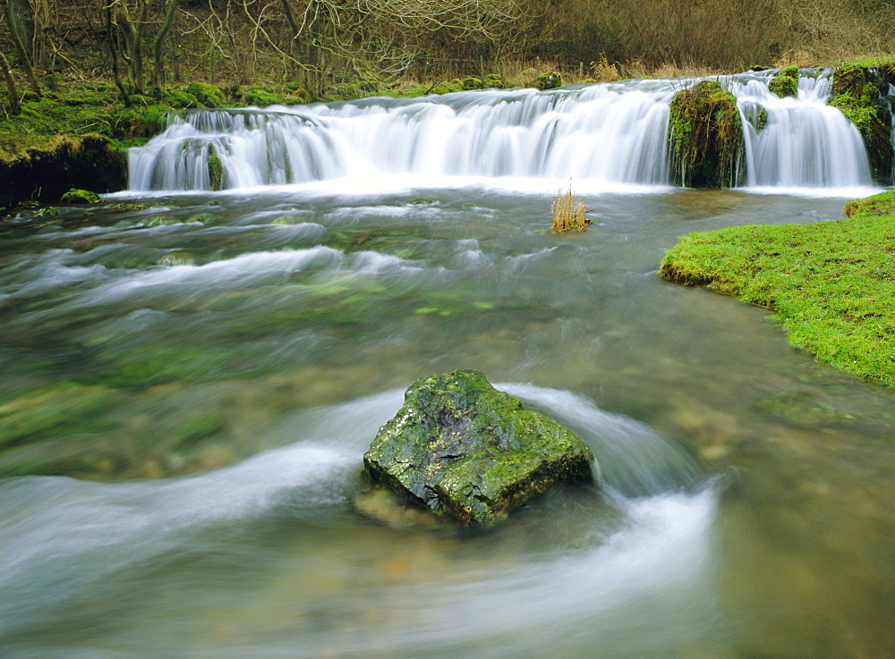 Waterfall on River Lathkill, Lathkill Dale, Peak District National Park, Bakewell, Derbyshire, England