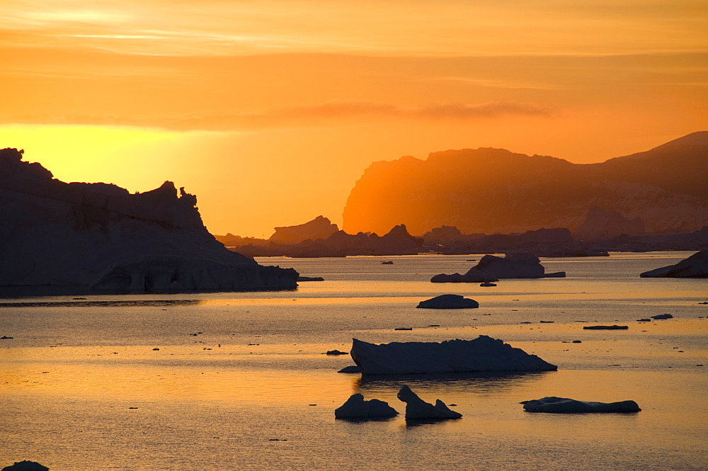 Sunrise on ice in the Antarctic Sound, Antarctic Peninsula, Antarctica, Polar Regions