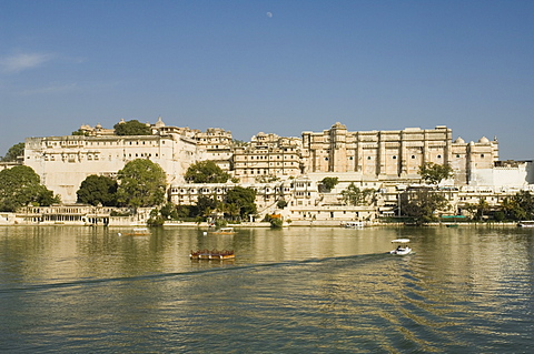 View of the City Palace and hotels from Lake Pichola, Udaipur, Rajasthan,  India