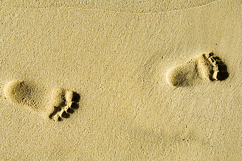 Child's footprints on beach at Santa Maria, Sal (Salt), Cape Verde Islands, Africa