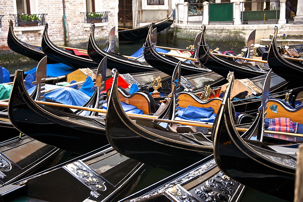 Gondolas parking on a canal, Venice, UNESCO World Heritage Site, Veneto, Italy, Europe