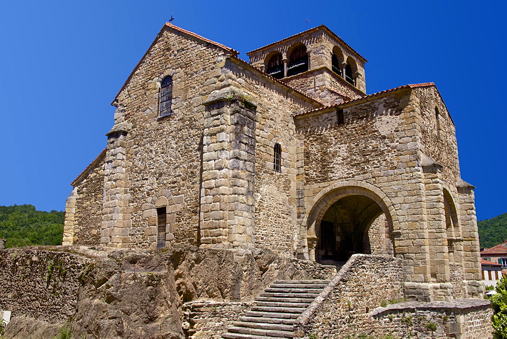 Saint Laurent Collegiate church dating from the 12th century, and village, Auzon, Haute Loire, France, Europe