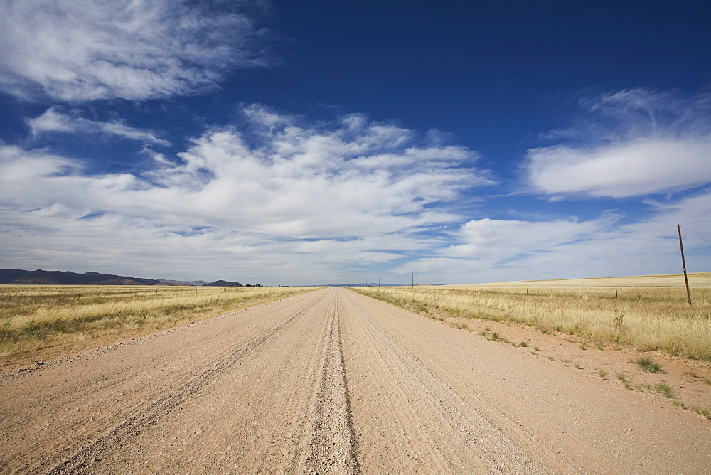 Empty gravel road going north from Sossusvlei, Central Namibia, Namibia, Africa